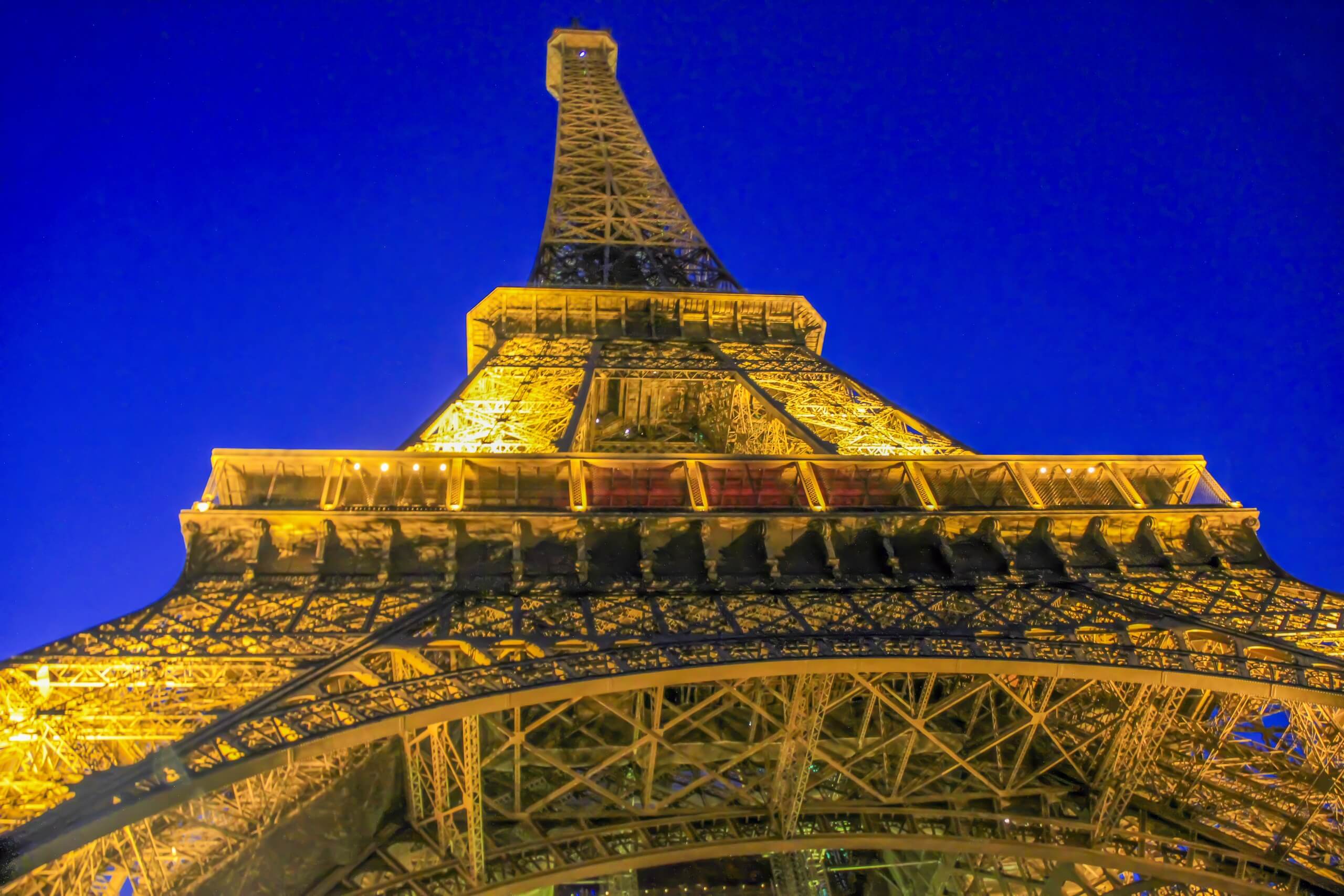 Architectural Fine Art titled Iron Geometry, an upward view of the Eiffel Tower structure.