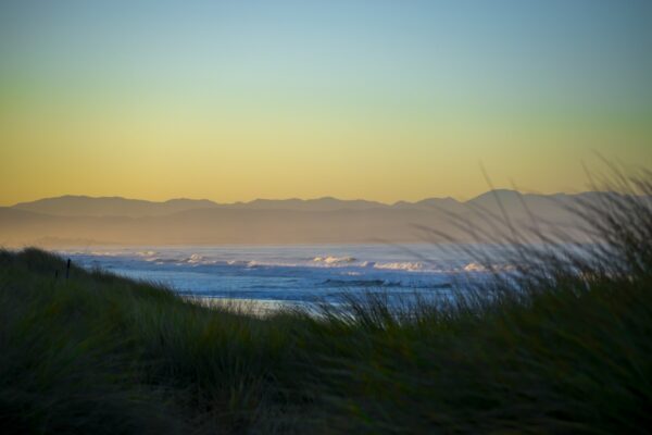 Ocean Landscape Fine Art titled Splendid Sunrise by Philip J. Guettler.
