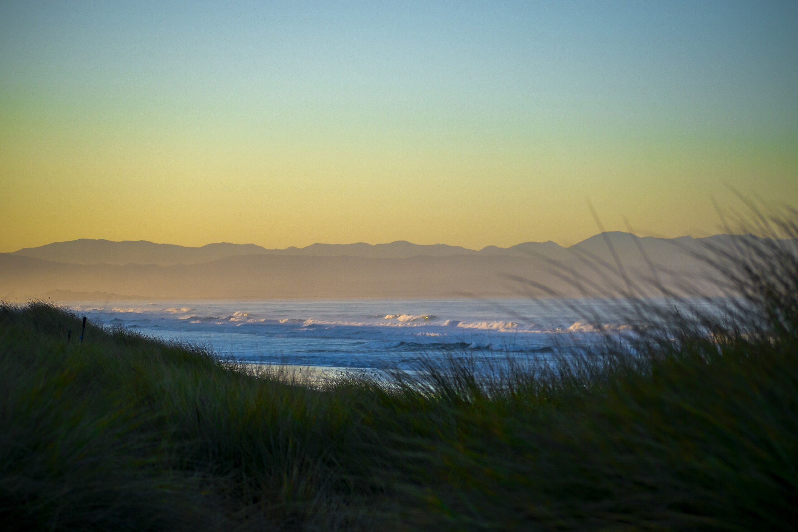 Ocean Landscape Fine Art titled Splendid Sunrise by Philip J. Guettler.